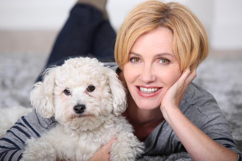 Pet Allergies Myths lady with white dog